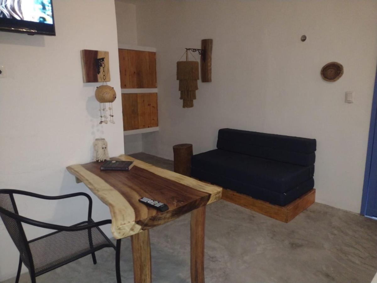 Mio Tulum Hotel Boutique Екстер'єр фото A living room in a hotel in Greece